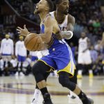 Cleveland Cavaliers guard JR Smith fouls Golden State Warriors guard Stephen Curry (30) during the second half of Game 4 of basketball's NBA Finals in Cleveland, Friday, June 9, 2017. (AP Photo/Tony Dejak)