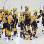 Nashville Predators players celebrate after their 4-1 win over the Pittsburgh Penguins in Game 4 of the NHL hockey Stanley Cup Finals Monday, June 5, 2017, in Nashville, Tenn. (AP Photo/Mark Humphrey)