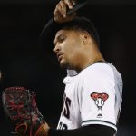 Arizona Diamondbacks' Taijuan Walker pauses on the mound after giving up a run to the St. Louis Cardinals during the first inning of a baseball game, Tuesday, June 27, 2017, in Phoenix. (AP Photo/Ross D. Franklin)