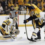 Pittsburgh Penguins goalie Matt Murray (30) stops a shot by Nashville Predators right wing Craig Smith (15) as Olli Maatta (3), of Finland, defends during the first period in Game 4 of the NHL hockey Stanley Cup Finals Monday, June 5, 2017, in Nashville, Tenn. (AP Photo/Mark Humphrey)