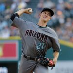 Arizona Diamondbacks pitcher Zack Greinke throws against the Detroit Tigers in the first inning of a baseball game in Detroit, Tuesday, June 13, 2017. (AP Photo/Paul Sancya)