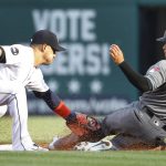 Detroit Tigers shortstop Jose Iglesias tags Arizona Diamondbacks' Gregor Blanco (5) out attempting to steal second base in the first inning of a baseball game in Detroit, Tuesday, June 13, 2017. (AP Photo/Paul Sancya)