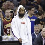 New York Giants wide receiver Odell Beckham, Jr. watches the Cleveland Cavaliers and Golden State Warriors in the first half of Game 4 of basketball's NBA Finals in Cleveland, Friday, June 9, 2017. (AP Photo/Tony Dejak)