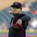 Arizona Diamondbacks starting pitcher Taijuan Walker winds up during the first inning of the team's baseball game against the Detroit Tigers, Wednesday, June 14, 2017, in Detroit. (AP Photo/Carlos Osorio)