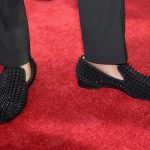 Kentucky's Malik Monk shows off his shoes as he stops for photos while walking the red carpet before the start of the NBA basketball draft, Thursday, June 22, 2017, in New York. (AP Photo/Frank Franklin II)
