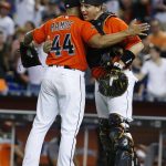 Miami Marlins relief pitcher AJ Ramos (44) and catcher A.J. Ellis congratulate each other after they defeated the Arizona Diamondbacks in a baseball game, Sunday, June 4, 2017, in Miami. (AP Photo/Wilfredo Lee)