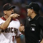 Arizona Diamondbacks manager Torey Lovullo (17) argues with umpire D.J. Reyburn, right, after Lovullo is ejected during the fourth inning of a baseball game against the St. Louis Cardinals, Wednesday, June 28, 2017, in Phoenix. (AP Photo/Ross D. Franklin)