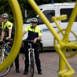 German police officers patrol near Burgplatz square prior to the team presentation of the Tour de France cycling race in the center of Duesseldorf, Germany, Thursday, June 29, 2017. (AP Photo/Peter Dejong)