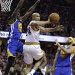 Cleveland Cavaliers forward Richard Jefferson (24) passes as Golden State Warriors forward Draymond Green, left, defends during the first half of Game 4 of basketball's NBA Finals in Cleveland, Friday, June 9, 2017. (AP Photo/Tony Dejak)