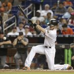 Miami Marlins' JT Riddle grounds out to first, driving in J.T. Realmuto during the fourth inning of the team's baseball game against the Arizona Diamondbacks, Friday, June 2, 2017, in Miami. (AP Photo/Lynne Sladky)