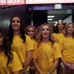 Cheerleaders watch television coverage of Game 4 of basketball's NBA Finals between the Golden State Warriors and the Cleveland Cavaliers, Friday, June 9, 2017, at Oracle Arena in Oakland, Calif. (AP Photo/Marcio Jose Sanchez)