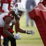 Arizona Cardinals wide receiver Larry Clark moves into position to make a block as players run drills during an NFL football organized team activity, Thursday, June 1, 2017, at the team training facility in Tempe, Ariz. (AP Photo/Ross D. Franklin)