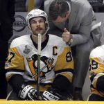 Pittsburgh Penguins head coach Mike Sullivan, right, talks with center Sidney Crosby, left, during the third period against the Nashville Predators in Game 4 of the NHL hockey Stanley Cup Finals Monday, June 5, 2017, in Nashville, Tenn. (AP Photo/Mark Humphrey)