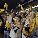Nashville Predators fans celebrate a goal against the Pittsburgh Penguins during the second period in Game 3 of the NHL hockey Stanley Cup Finals Saturday, June 3, 2017, in Nashville, Tenn. (AP Photo/Mark Humphrey)