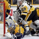 Nashville Predators goalie Pekka Rinne (35), of Finland, stops a shot by Pittsburgh Penguins center Jake Guentzel (59) during the second period in Game 4 of the NHL hockey Stanley Cup Finals Monday, June 5, 2017, in Nashville, Tenn. (AP Photo/Mark Humphrey)