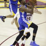 Golden State Warriors forward Kevin Durant (35) shoots as Cleveland Cavaliers guard Kyle Korver (26) defends during the first half of Game 4 of basketball's NBA Finals in Cleveland, Friday, June 9, 2017. (AP Photo/Tony Dejak)