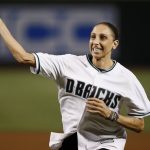 Phoenix Mercury's Diana Taurasi throws out the first pitch prior to a baseball game between the Arizona Diamondbacks and the St. Louis Cardinals Wednesday, June 28, 2017, in Phoenix. Taurasi became the WNBA basketball all-time career leader in scoring recently hitting the 7,489 point mark. (AP Photo/Ross D. Franklin)