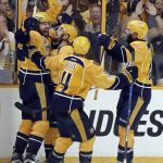 Nashville Predators right wing James Neal, left, celebrates with teammates his goal against the Pittsburgh Penguins during the second period in Game 3 of the NHL hockey Stanley Cup Finals Saturday, June 3, 2017, in Nashville, Tenn. (AP Photo/Mark Humphrey)