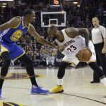 Golden State Warriors forward Kevin Durant (35) defends Cleveland Cavaliers forward LeBron James (23) diromg the first half of Game 4 of basketball's NBA Finals in Cleveland, Friday, June 9, 2017. (AP Photo/Tony Dejak)