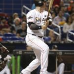 Miami Marlins' Justin Bour watches his two-run home run during the first inning of a baseball game against the Arizona Diamondbacks, Friday, June 2, 2017, in Miami. (AP Photo/Lynne Sladky)