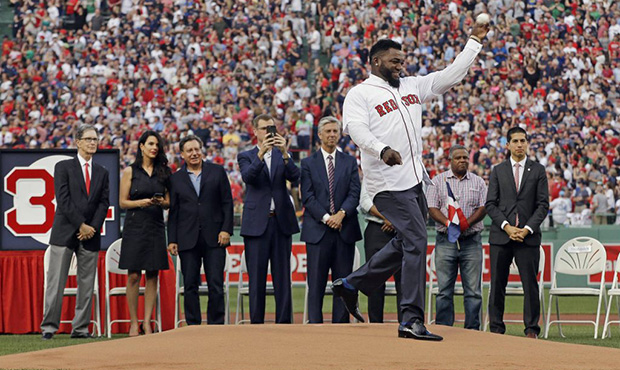 Boston Red Sox baseball great David Ortiz throws out the ceremonial first pitch, Friday, June 23, 2...