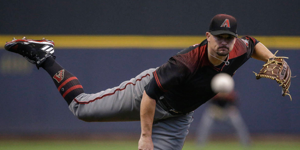 Arizona Diamondbacks' Zack Godley pitches to a Milwaukee Brewers batter during the first inning of ...