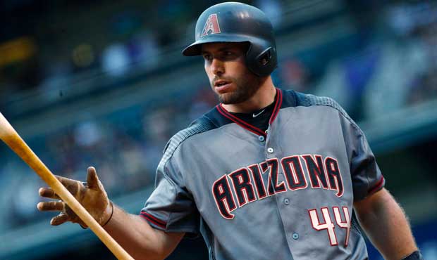 Arizona Diamondbacks' Paul Goldschmidt reacts after swinging and missing a pitch from Colorado Rock...