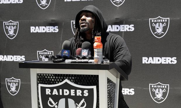Oakland Raiders running back Marshawn Lynch fields questions after the team's organized team activi...