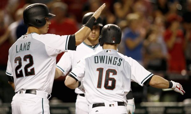 Arizona Diamondbacks' Chris Owings (16) celebrates his three-run home run against the San Diego Pad...