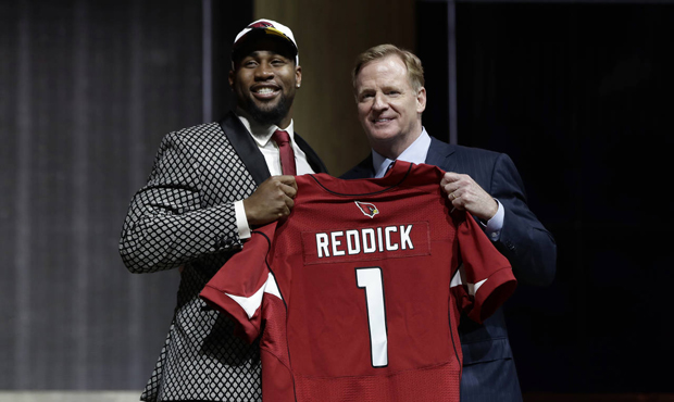 Temple's Haason Reddick, left, poses with NFL commissioner Roger Goodell after being selected by th...