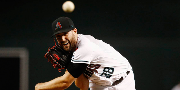 Arizona Diamondbacks' Robbie Ray throws a pitch against the San Diego Padres during the first innin...