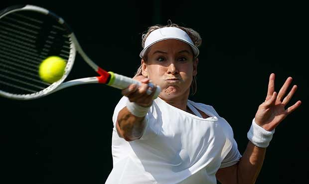 Bethanie Mattek-Sands of the United States returns the ball to Romania's Sorana Cirstea during thei...