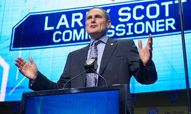 Pac-12 Commissioner Larry Scott speaks at Pac-12 NCAA college football Media Day, Wednesday, July 2...