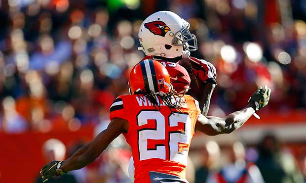 Arizona Cardinals wide receiver Jaron Brown (13) catches a pass in front of Cleveland Browns corner...