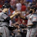 Arizona Diamondbacks relief pitcher Fernando Rodney, right, and catcher Chris Iannetta celebrates following the team's 4-0 victory over the St. Louis Cardinals in a baseball game Thursday, July 27, 2017, in St. Louis. (AP Photo/Jeff Roberson)