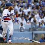 Los Angeles Dodgers' Justin Turner watches his RBI-single against the Arizona Diamondbacks during the first inning of a baseball game in Los Angeles, Tuesday, July 4, 2017. (AP Photo/Chris Carlson)