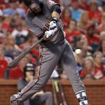 Arizona Diamondbacks' J.D. Martinez hits a grand slam during the fourth inning against the St. Louis Cardinals in a baseball game Thursday, July 27, 2017, in St. Louis. (AP Photo/Jeff Roberson)