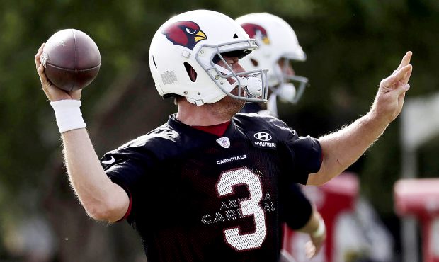 Arizona Cardinals Carson Palmer (3) runs drills during an NFL football organized team activity, Tue...