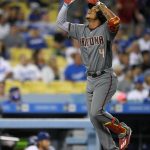 Arizona Diamondbacks' Ketel Marte gestures as he scores on his solo home run during the eighth inning of a baseball game against the Los Angeles Dodgers, Thursday, July 6, 2017, in Los Angeles. (AP Photo/Mark J. Terrill)