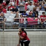 Arizona Cardinals wide receiver Larry Fitzgerald takes a knee during the first day of the team's NFL football training camp, Saturday, July 22, 2017, in Glendale, Ariz. (AP Photo/Matt York)