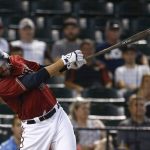 Arizona Diamondbacks' J.D. Martinez connects for a two-run home run against the Atlanta Braves during the eighth inning of a baseball game Wednesday, July 26, 2017, in Phoenix. The Diamondbacks' Martinez had two home runs for the game and the Diamondbacks defeated the Braves 10-3. (AP Photo/Ross D. Franklin)