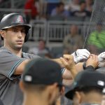 Arizona Diamondbacks first baseman Paul Goldschmidt (44) is greeted at the dugout entrance after hitting a solo-home run in the seventh inning of a baseball game against the Atlanta Braves Friday, July 14, 2017, in Atlanta. (AP Photo/John Bazemore)