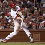 St. Louis Cardinals' Jedd Gyorko hits an RBI-single during the sixth inning of a baseball game against the Arizona Diamondbacks, Friday, July 28, 2017, in St. Louis. (AP Photo/Jeff Roberson)