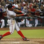 Washington Nationals' Wilmer Difo connects for a home run against the Arizona Diamondbacks during the seventh inning of a baseball game Sunday, July 23, 2017, in Phoenix. (AP Photo/Ross D. Franklin)