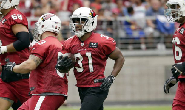 Arizona Cardinals running back David Johnson (31) runs drills during the first day of the team's NF...