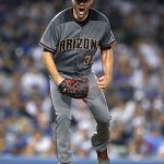 Arizona Diamondbacks starting pitcher Robbie Ray reacts after striking out Los Angeles Dodgers' Trayce Thompson with the bases loaded to end the sixth inning of a baseball game, Thursday, July 6, 2017, in Los Angeles. (AP Photo/Mark J. Terrill)