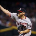 Washington Nationals' Stephen Strasburg throws a pitch against the Arizona Diamondbacks during the first inning of a baseball game Sunday, July 23, 2017, in Phoenix.  (AP Photo/Ross D. Franklin)