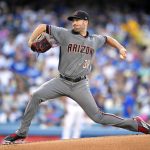 Arizona Diamondbacks starting pitcher Robbie Ray winds up during the first inning of the team's baseball game against the Los Angeles Dodgers, Thursday, July 6, 2017, in Los Angeles. (AP Photo/Mark J. Terrill)