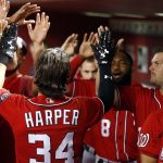 Washington Nationals' Bryce Harper (34) celebrates his home run against the Arizona Diamondbacks during the first inning of a baseball game Saturday, July 22, 2017, in Phoenix. (AP Photo/Ross D. Franklin)