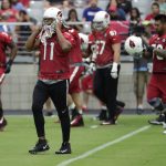 Arizona Cardinals wide receiver Larry Fitzgerald (11) takes the field during the first day of NFL football training camp, Saturday, July 22, 2017, in Glendale, Ariz. (AP Photo/Matt York)